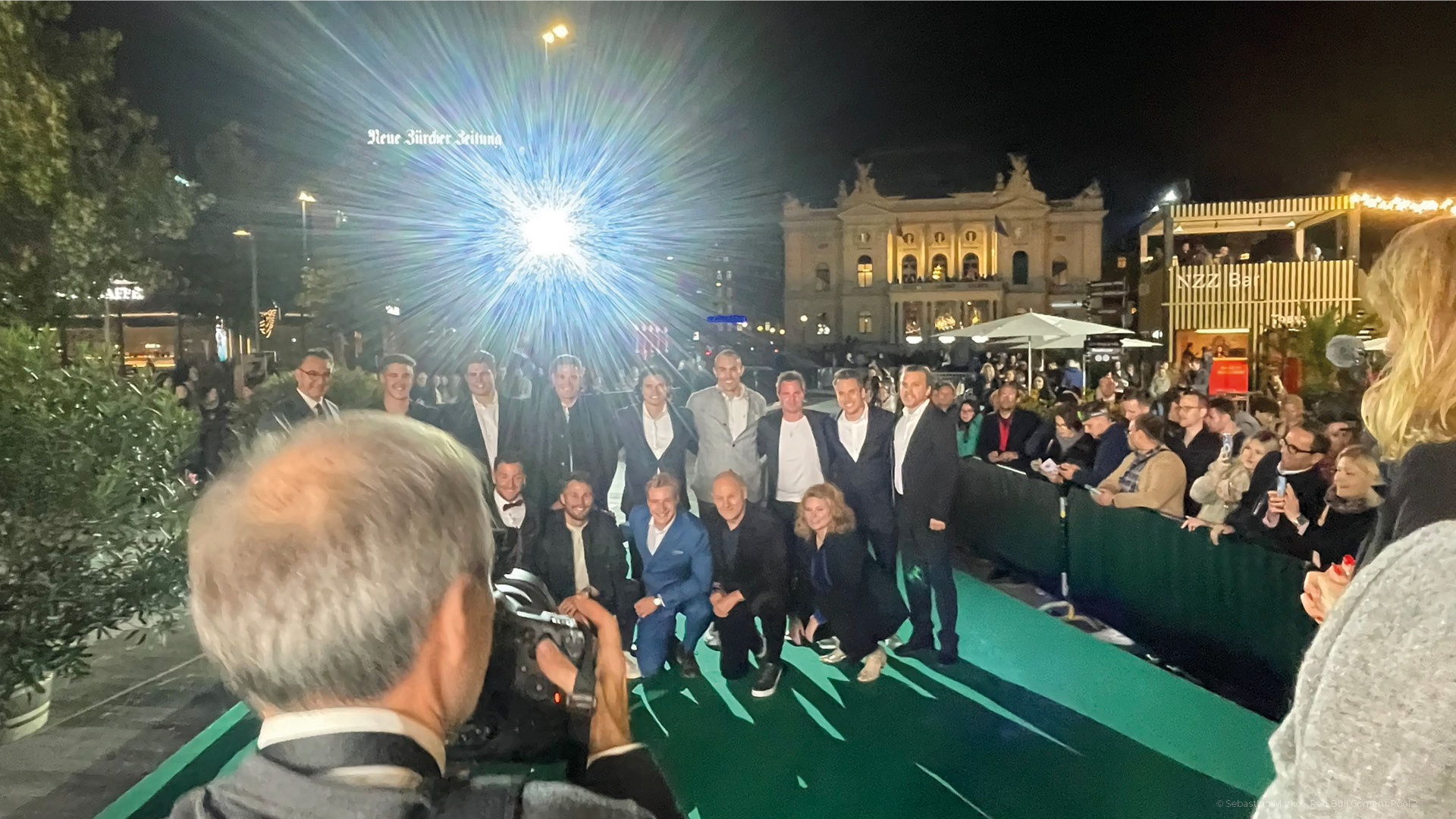 The team on the Green Carpet at night, Zurich Opera House behind